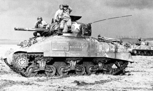 American Sherman tank crews practicing tactics in February England 1944, ahead of D-Day in June the same year