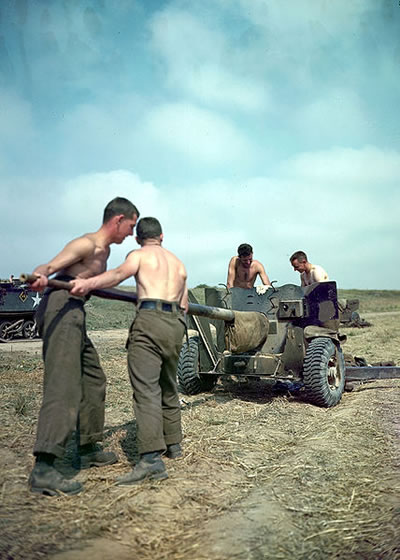 Canadian soliders with a 6 pounder anti-tank gun at Normandy in 1944