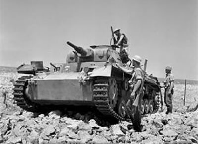 British soldiers with captured PzKpfw III medium tank in North Africa in 1944