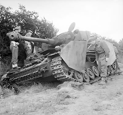 British officers examining a knocked out PzKpfw IV medium tank, June 1944