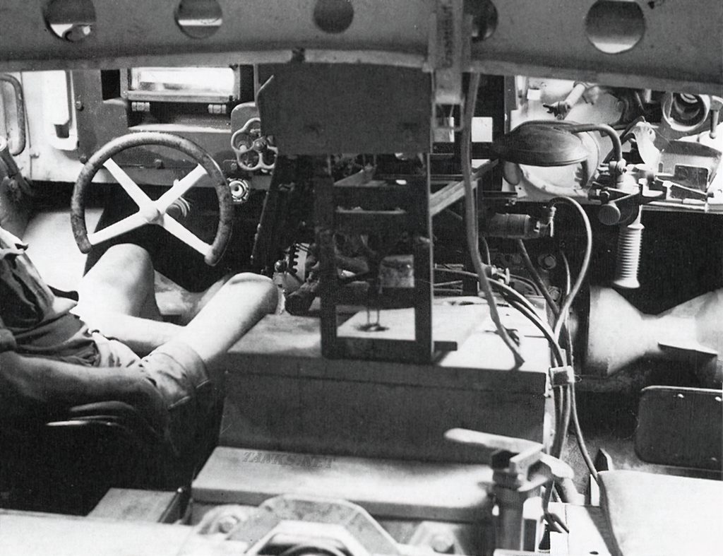 Inside a captured Tiger tank (Panzer VI Tiger I) with driver's position on the left and the hull machine gunner's position on the right.