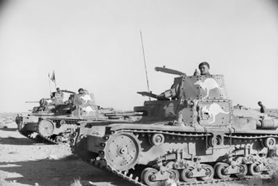 Captured Italian tanks - Carro Armato M13/40 (far left) and Carro Armato 11/39 (center right) - being used by Australian soliders at the Siege of Tobruk. Source: Australian War Memorial