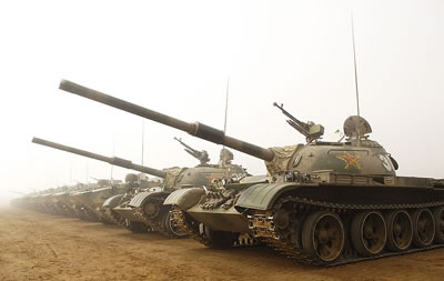 Type 59 main battle tanks (the front two tanks in the photo) at a training base in Shenyang, China