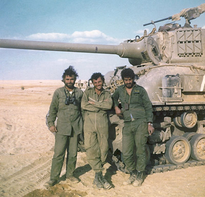 Israeli Soldiers in front of an M50 Super Sherman tank, October 1973