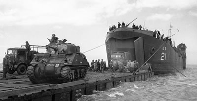 D-Day: British tanks being unloaded onto a Rhino barge
