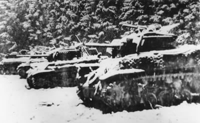 Destroyed M4 Sherman tanks at the Belgium-Luxembourg border during the Battle of the  Bulge. Source: German Federal Archive