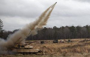 M1A1 ABV deploying MCLC (Mine Clearing Line Charge) to clear a minefield