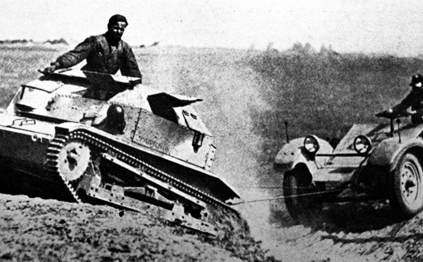 A trailer was towed by the tankette across country, but on roads the trailer carried the tankette and was powered along by the tank engine, saving precious track mileage